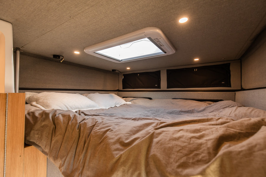 Warm wood, Corian, and expansive windows