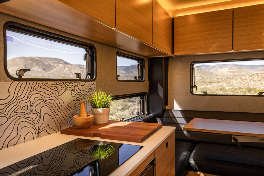 Warm wood, Corian, and expansive windows